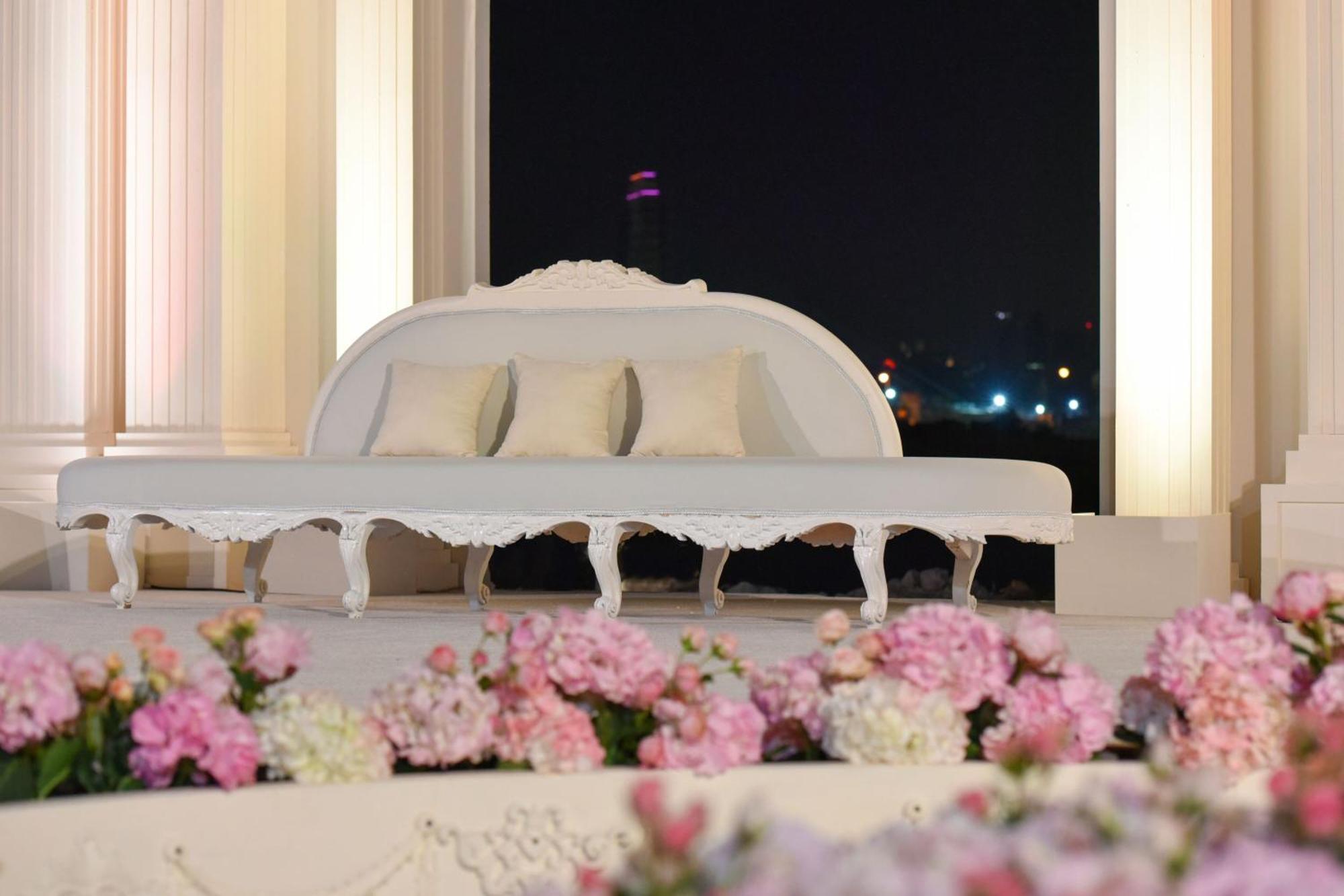 The Ritz-Carlton, Doha Hotel Exterior photo A traditional Malay wedding couch